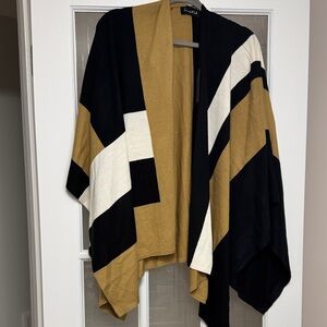 Elegant Black, Beige, and White Poncho